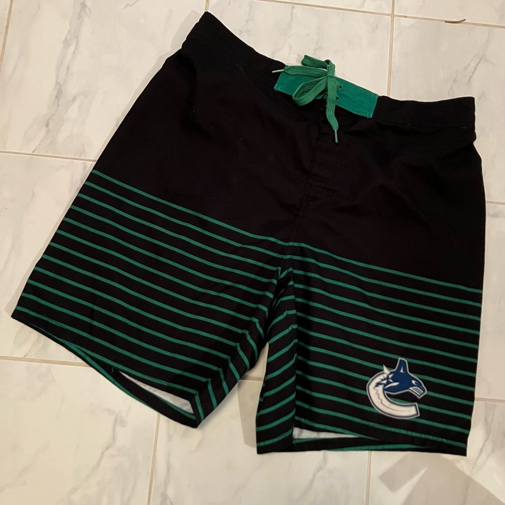 NHL Canucks Black and Green Striped Swim Shorts. Lined.  EUC!